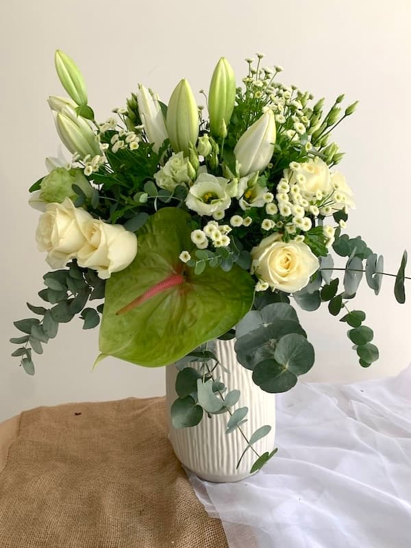Instagram post showing a vase with flowers