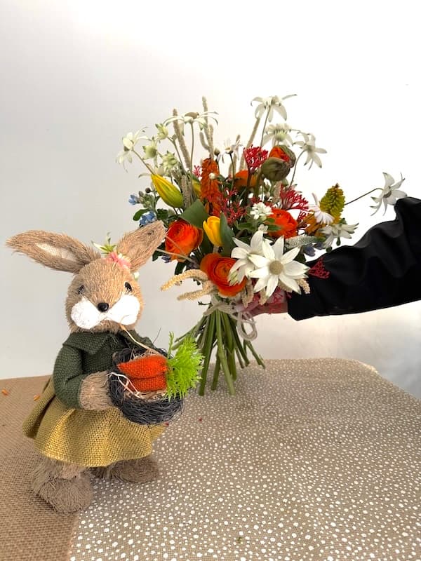 Instagram post showing a ceramic pot full of flowers